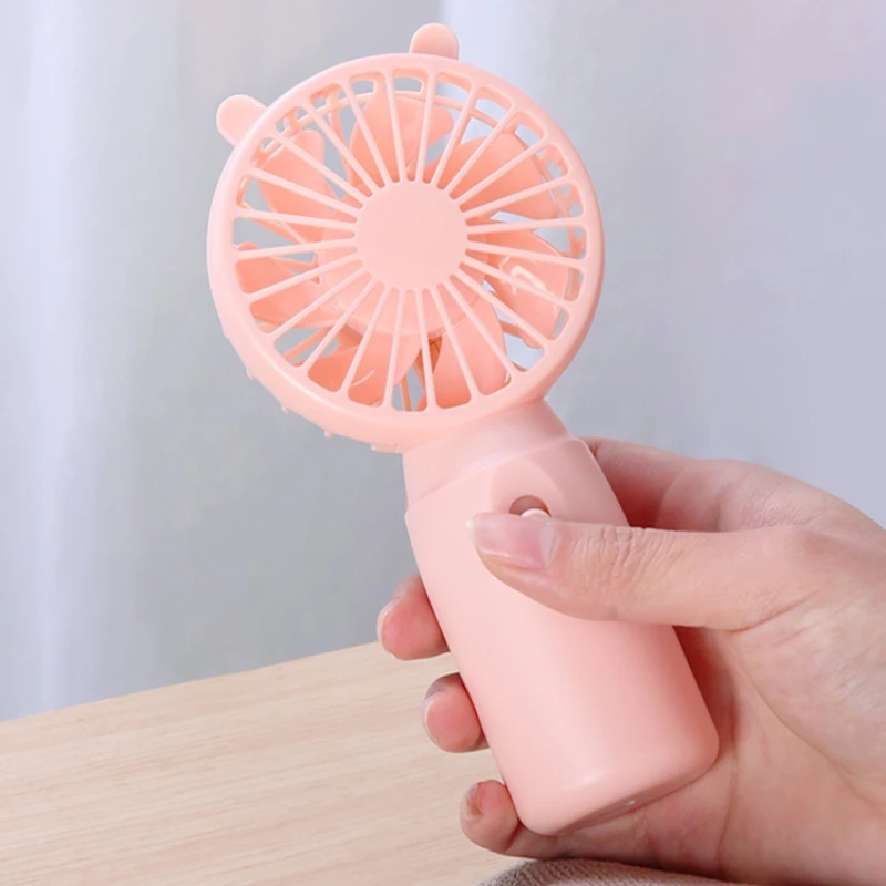 Wholesale Cute Mini Battery Portable Handheld Fan New Design Small Air Cooling Desktop Fan Household Hotel Use Perfect Gift Idea