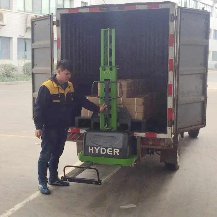 Electric powered self loading stacker for alternative solution to truck ramp and hydraulic pallet truck