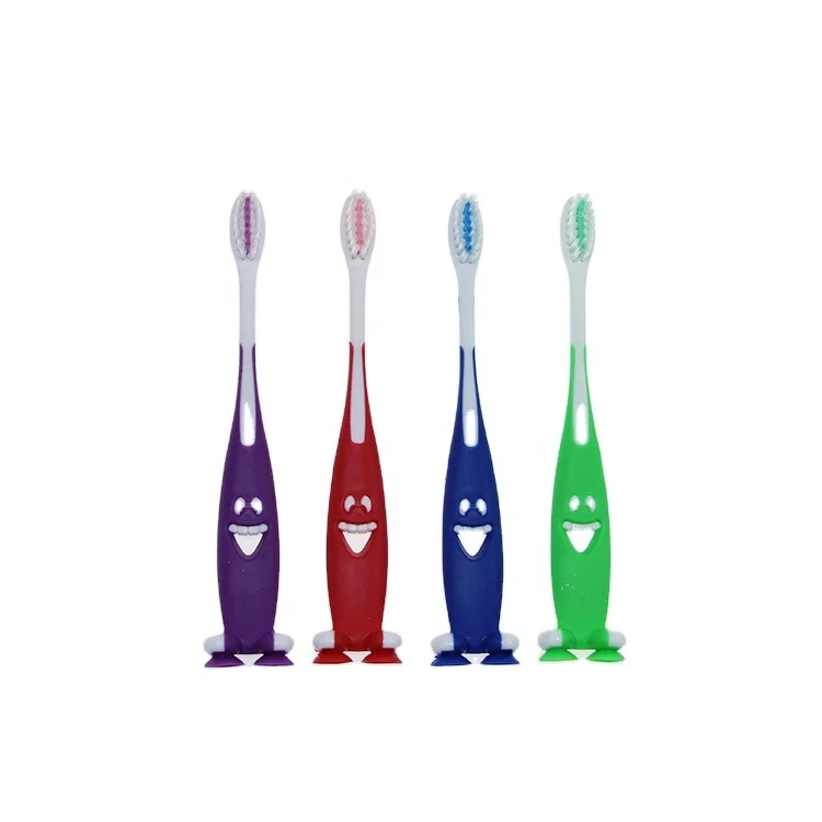 Free sample four colors toothbrush for children with suction cup custom logo kid manual dental brush oral clean 2024