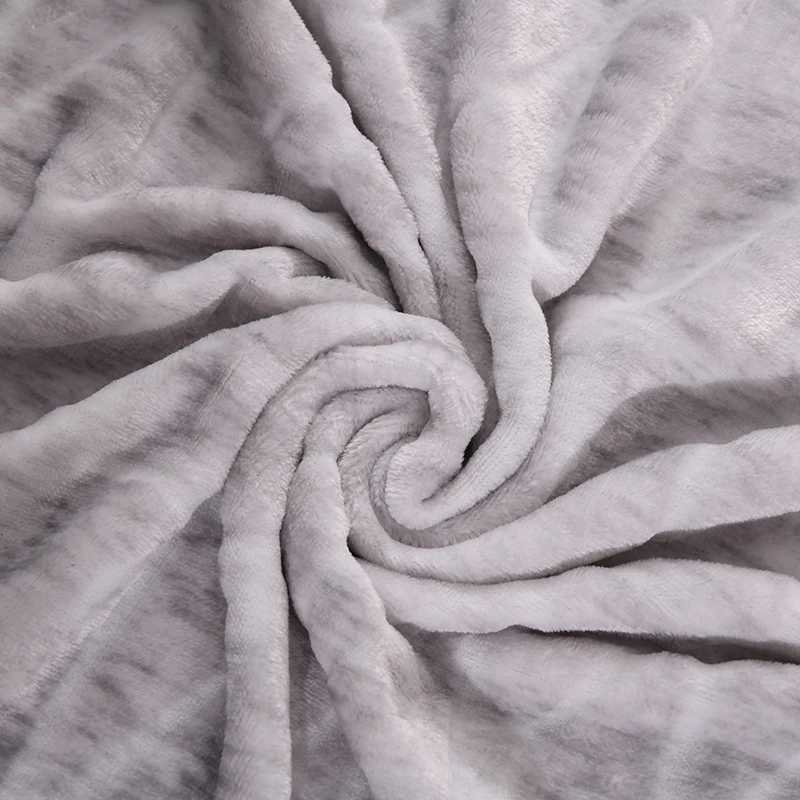 Flannel  throw/blanket  with  printed  and  carved  design