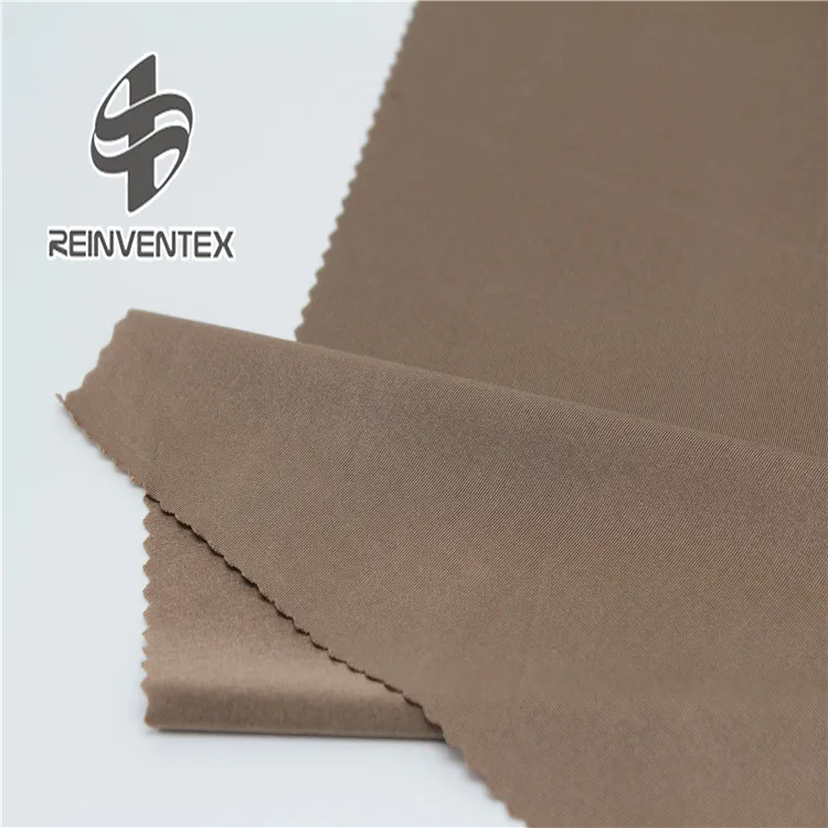 
1754 Shaoxing wholesale knit smooth single jersey shiny polyester spandex stock lot fabric for tshirt vest 