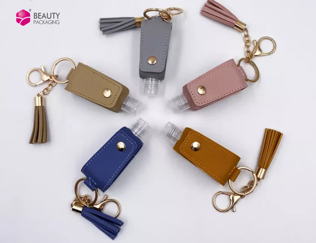 Pocket 30ml mini plastic spray hand sanitizer alcohol bottle with PU leather keychain holder;plastic bottle manufacturer