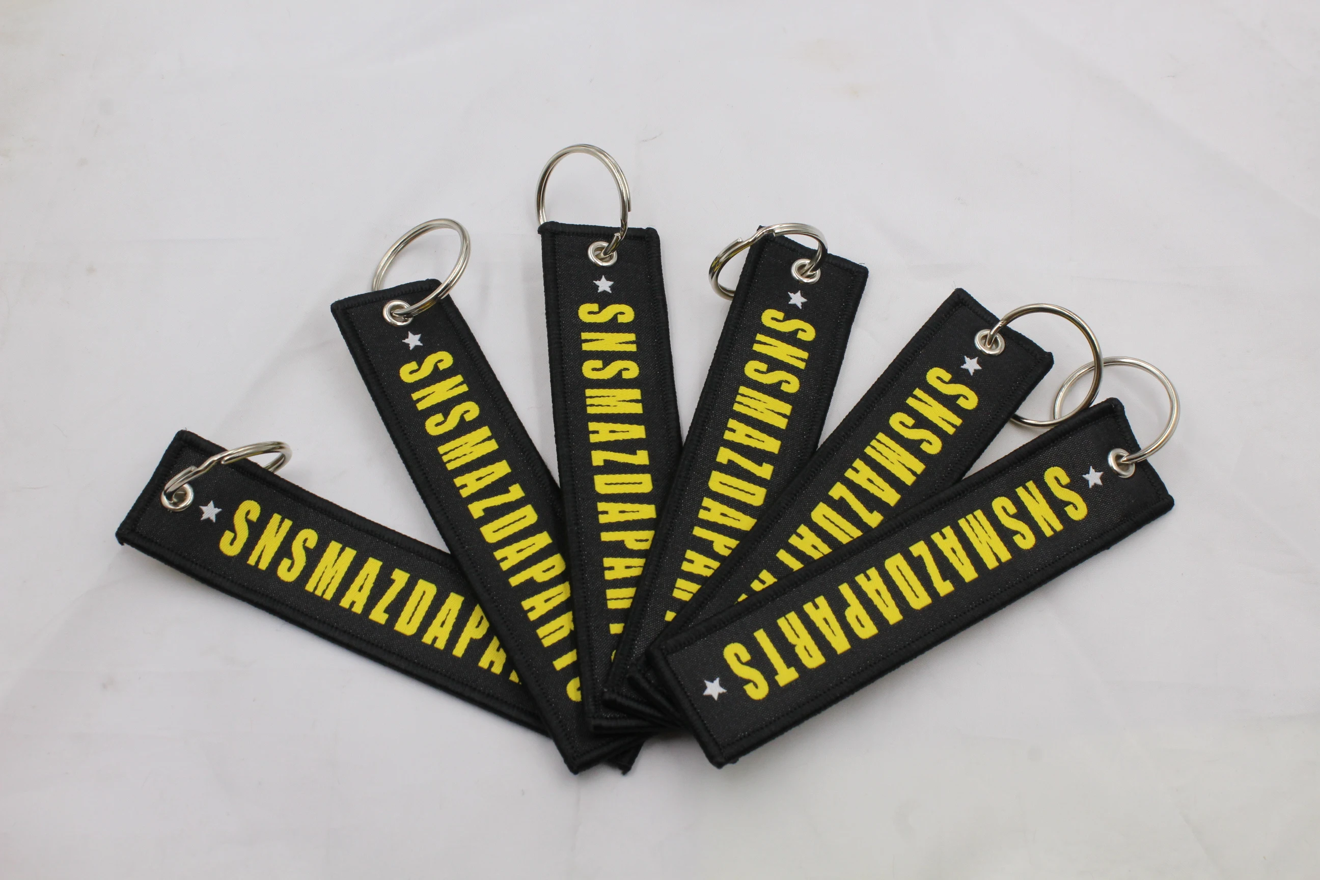 Wholesale High Quality Airplane Tags Fabric  Hand Woven Keychain For Motorcycle Bag