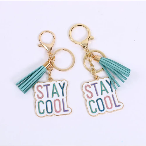 Factory direct sales private custom alloy drop oil seal glaze festival gift PU tassel key chain pendant