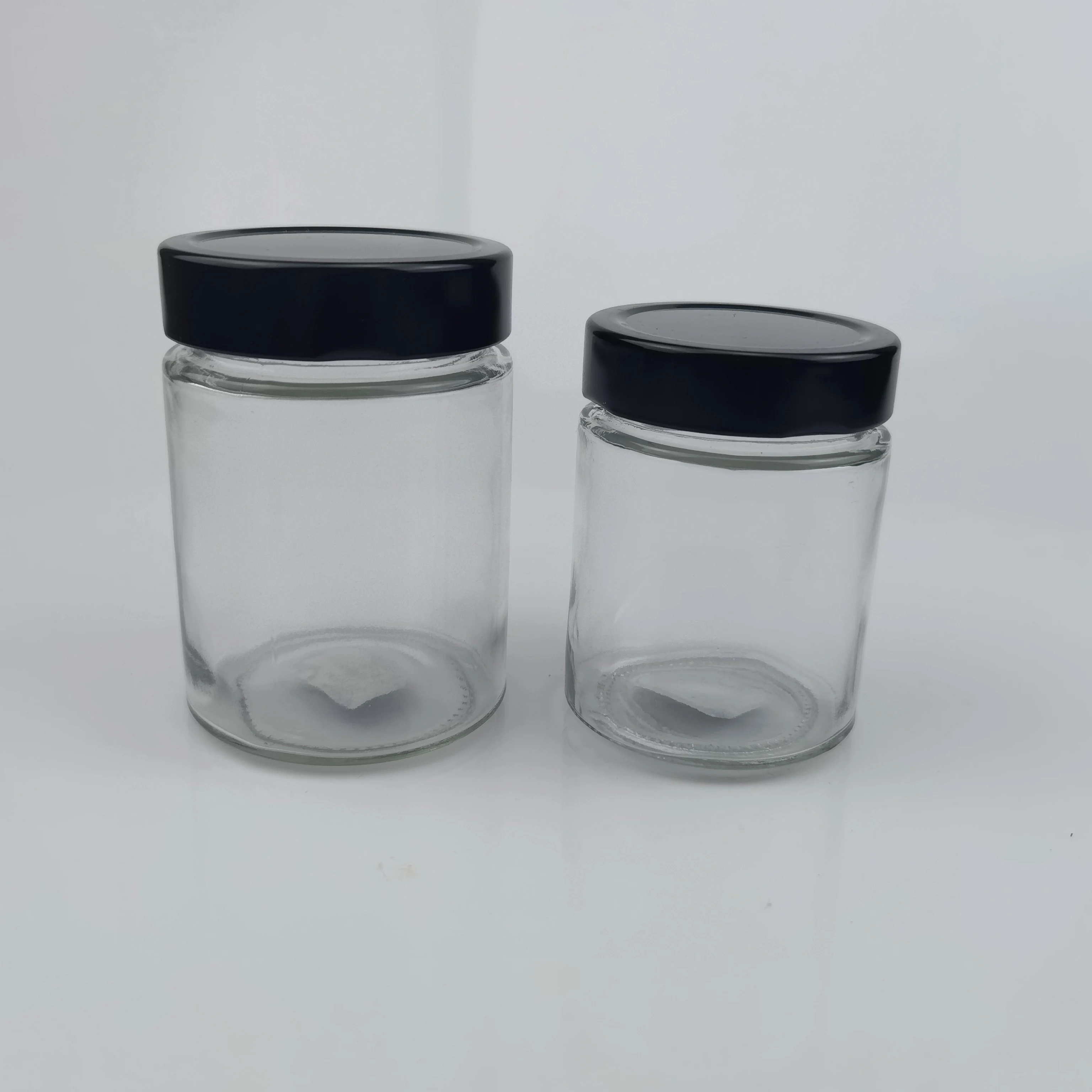 Factory price 100ml 140ml 180ml 200ml 220ml 280ml 212ml Round Shape Ergo Honey Glass Jar with Twist Metal Lid