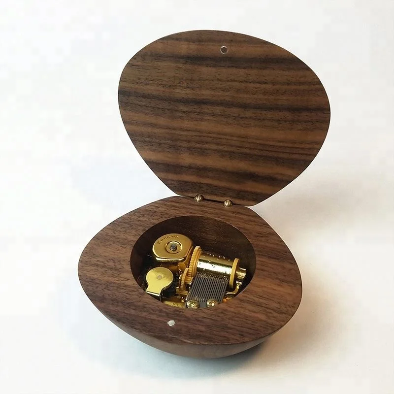Friends will like the birthday gift for an anniversary the classic walnut music box
