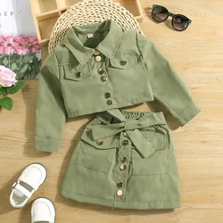 Hot sale American girls Spring and Fall long sleeves lapel jacket 2pcs + bow A- line short skirt suit