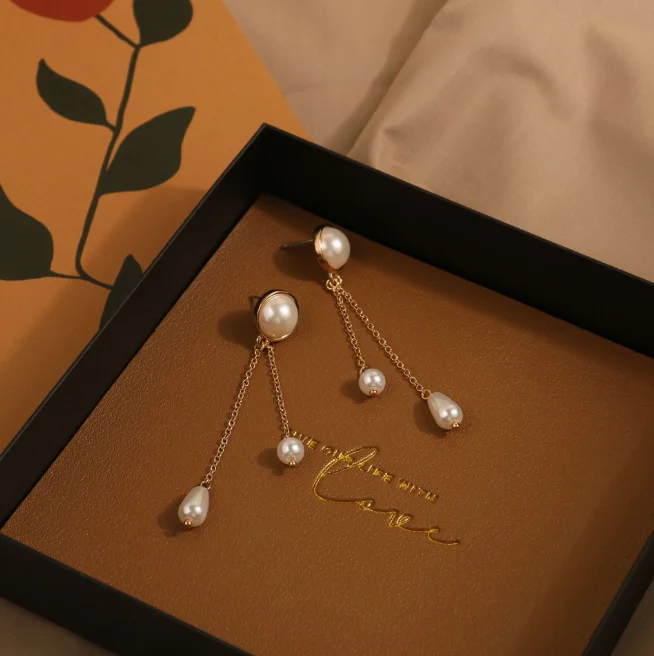 Stock lot South Korea Dongdaemun fashion style long tassel water drop pearl 925 silver needle earrings female