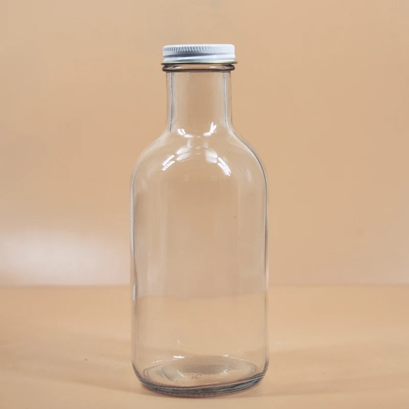 
 330ml 480ml 11oz 16oz  clear empty tall round drinking packaging glass bottles with screw cap for juice beverage tea milk  