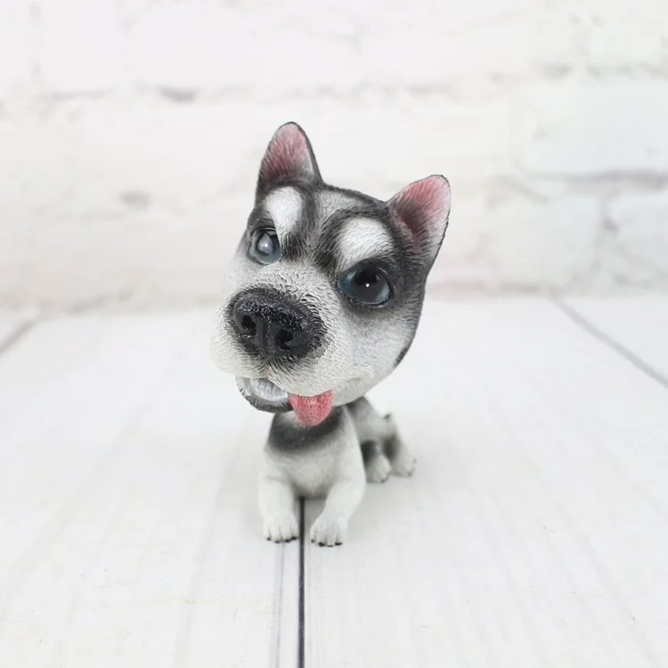 Cute doll simulation resin spring shake head dog car interior decoration lucky pet dog