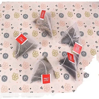 Disposable triangle nylon pyramid tea bags wholesale price tea bag with custom string