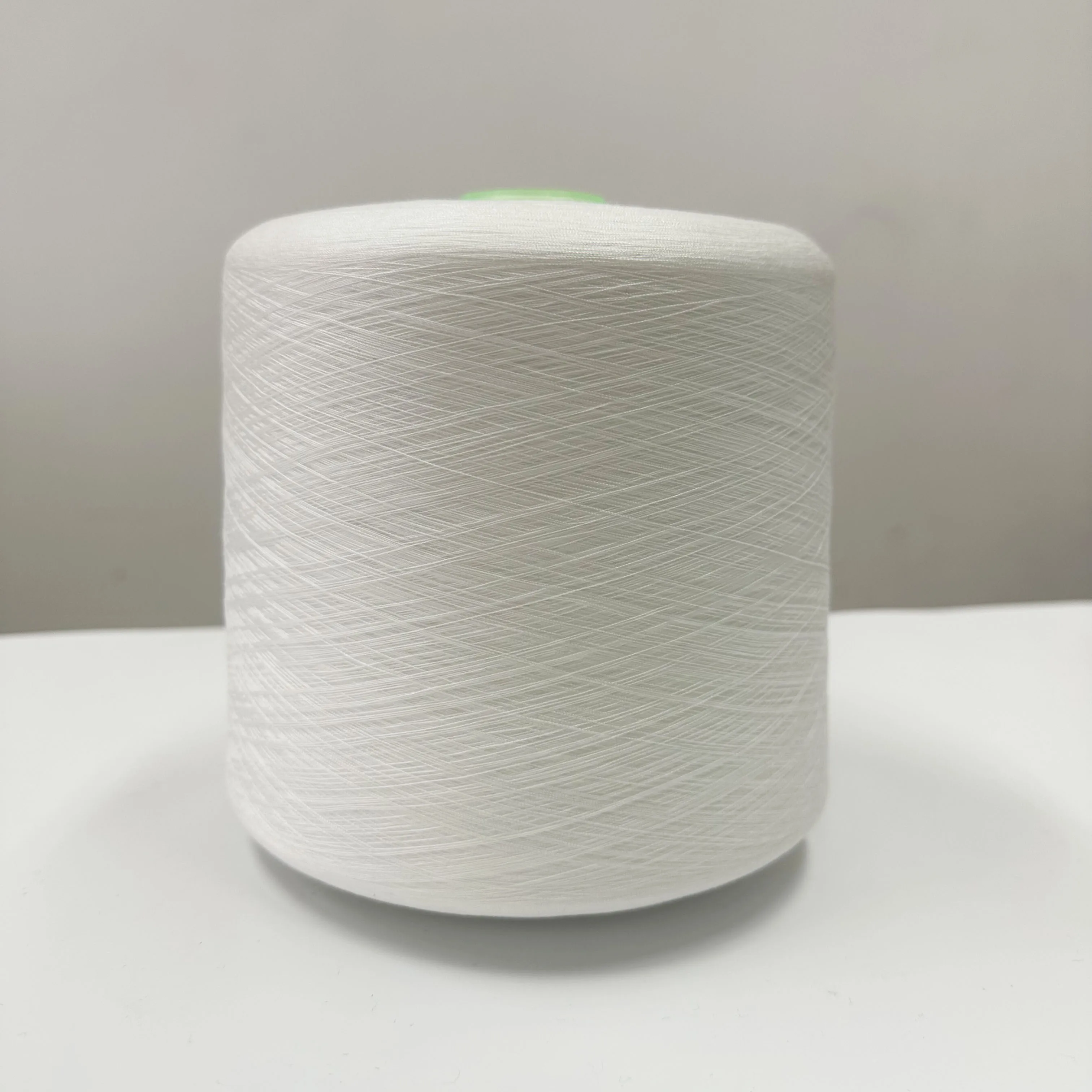 100% recycled polyester yarn raw white corespun durable sewing thread for denim