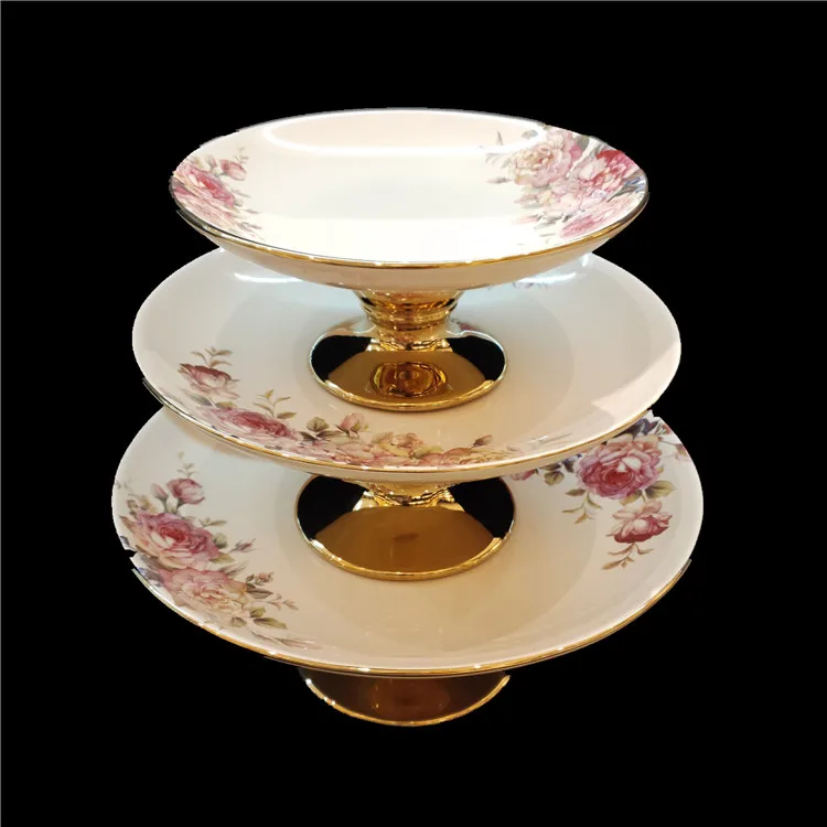 
2020 new design with flower ceramic plate gold leg dried fruit cakes high plate with leg 
