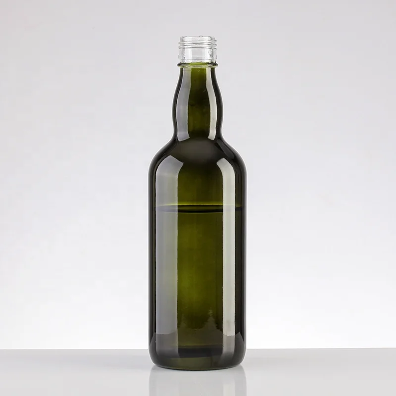 Old-fashioned green glass bottles for spirits, whiskey, rum and liqueur antique green color champagne glass bottle