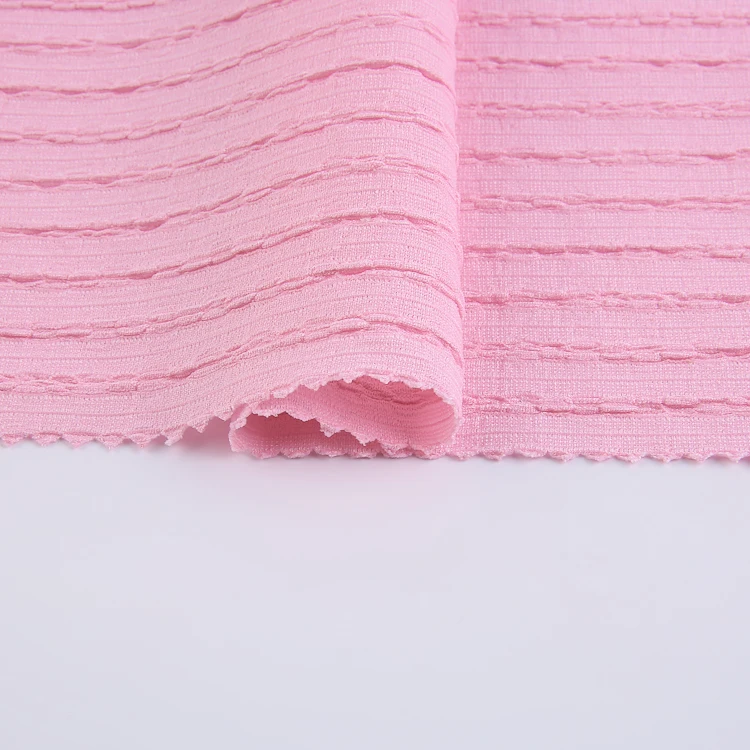 Popular light weight pink polyester warp knitted fabric 98%polyester 2%spandex warp knitting fabrics for garments
