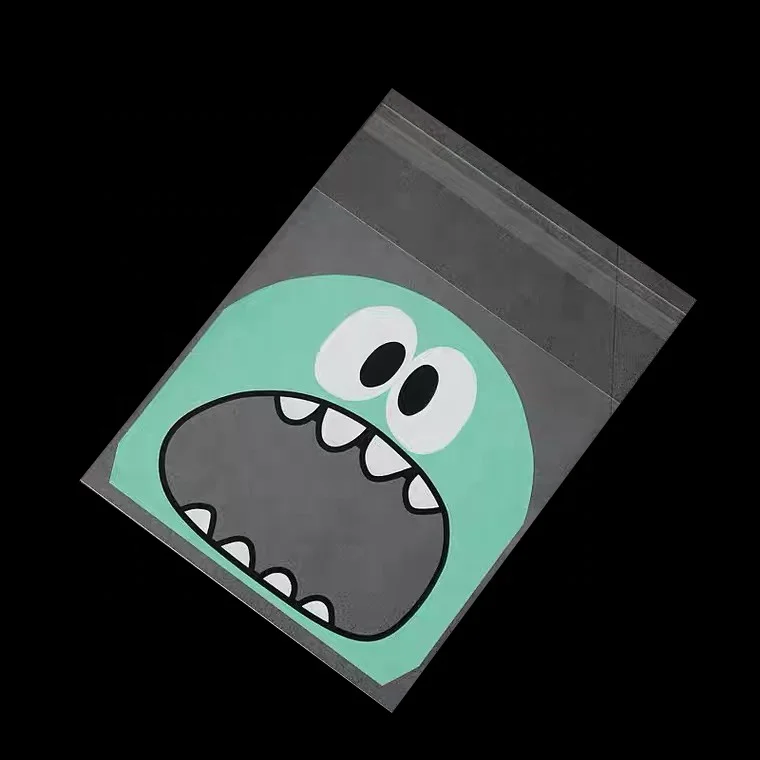 Factory wholesale mini DIY snack packaging self adhesive biscuit bags cellophane with cartoon