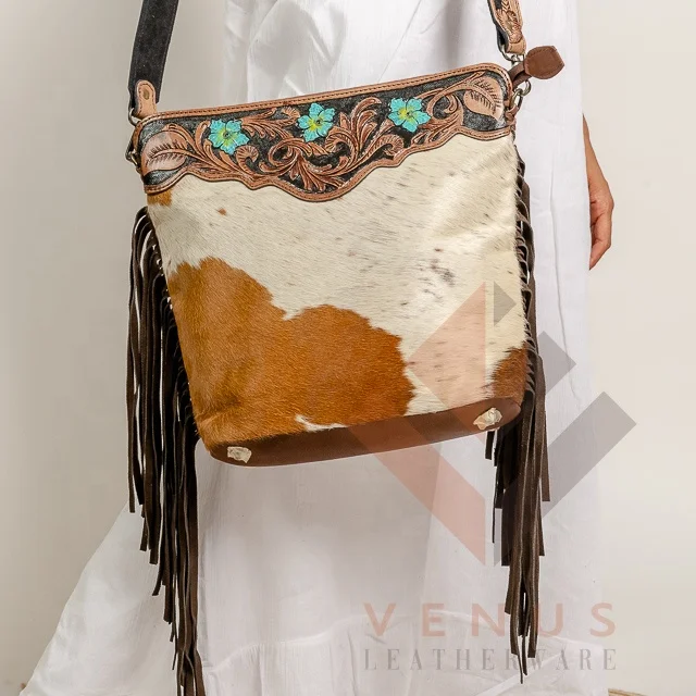 Hot Selling Bohemian Style Single Handle Cowhide Fur Leather Sling Bag for Women Portable Fringe Chains Decorated Carved Handbag