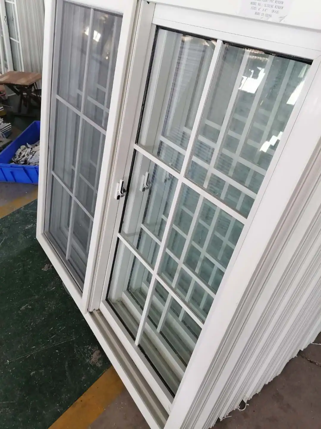 Manufacture Good Quality Ghana windows and doors with UPVC single glass sliding window and mosquito net