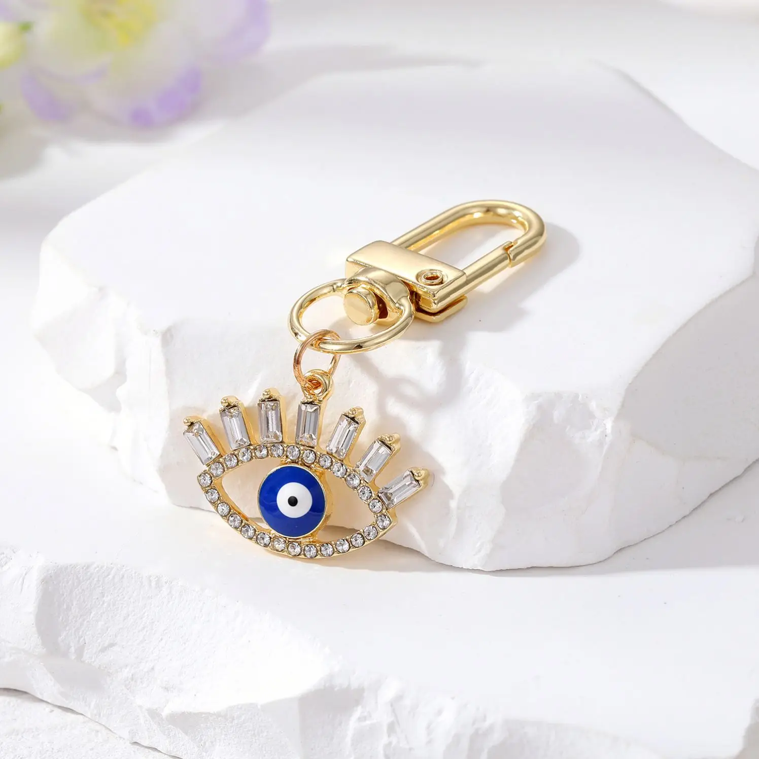 Cross-border e-commerce ornament hollow diamond eyelash eye keychain alloy geometric oil dripping Devil eye ornaments