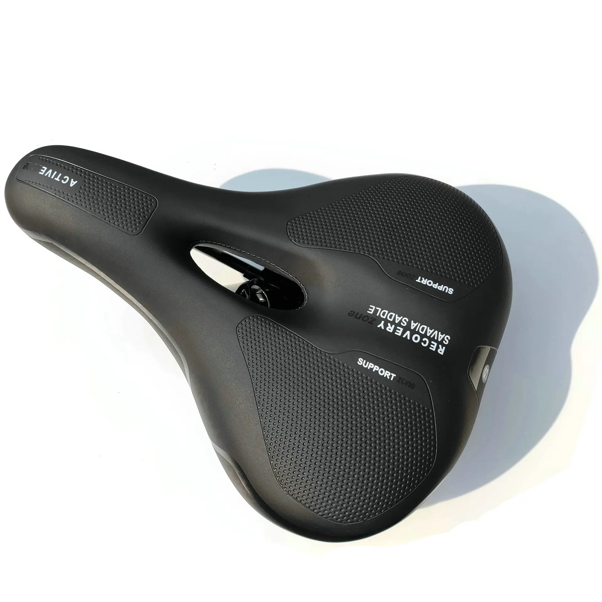 Soft saddle with enlarged and thickened middle hole for mountain bikes