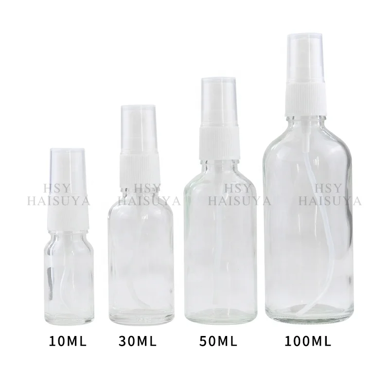 Wholesale cosmetics packaging 2oz 100ml filled oil perfume glass bottle with white spray spiral plastic cap