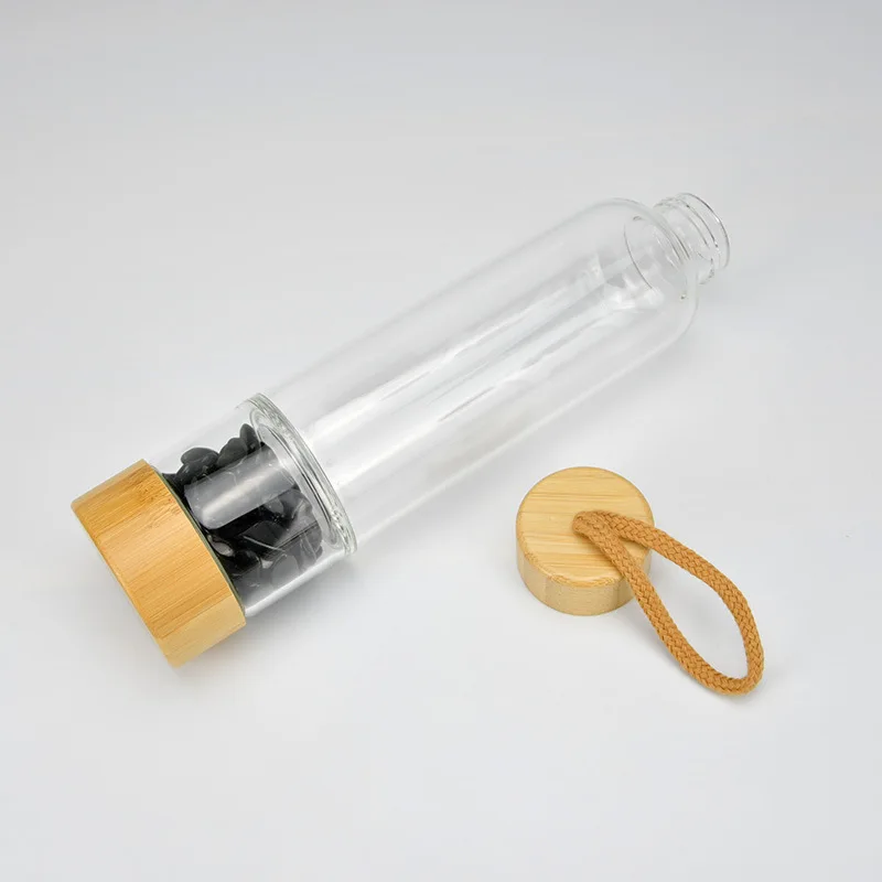 High Quality 17OZ Natural Crystal Infused Glass drink Water Bottle Bamboo Lid Gemstone Water Bottle With Crystal Inside