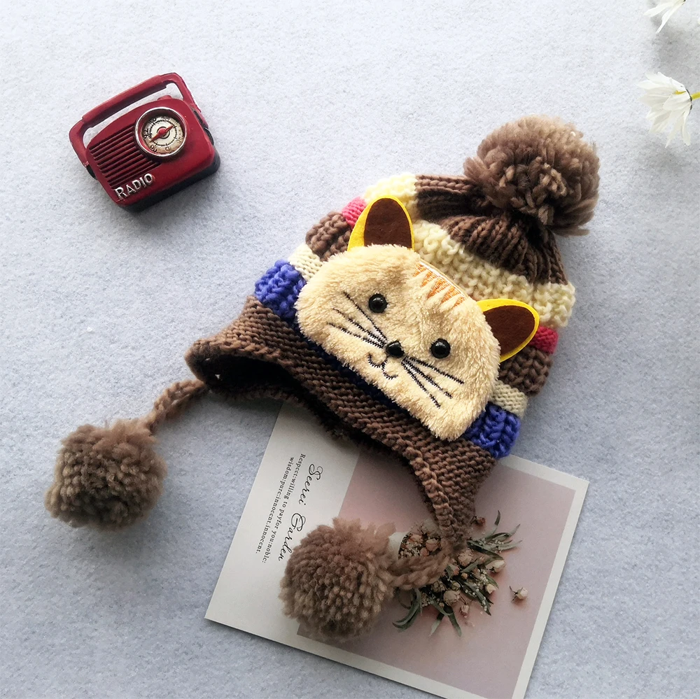 2022 Custom Cheap Baby Winter Hat Children Coral Fleece Lining Pom Pom Warm Beanie 100% Acrylic Unisex Cute Bear Cat Knitted Hat