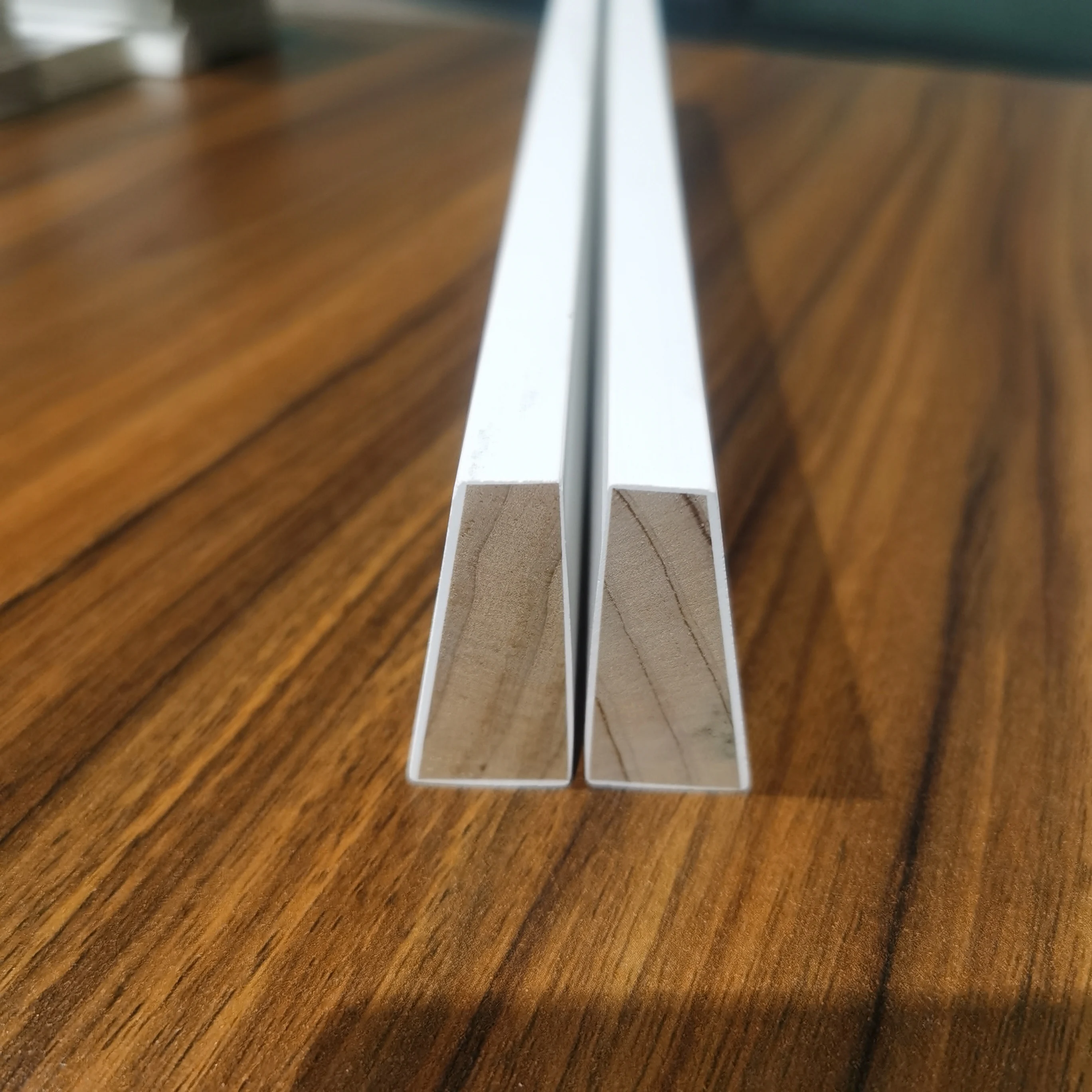 white primed wooden window sill wooden panel door skirting moulding wood frame