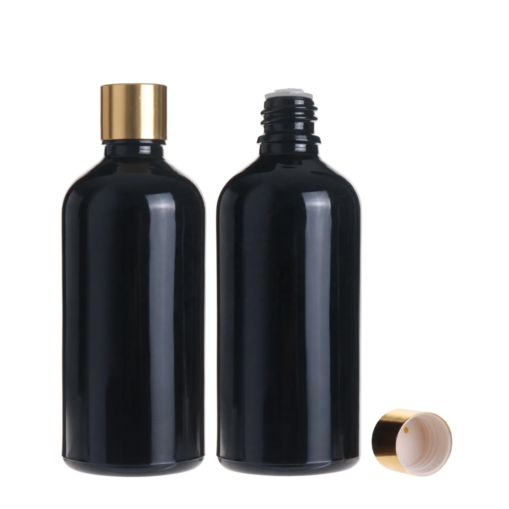 Empty round massage essential oil cosmetic black glass bottle 100ml with golden screw cap