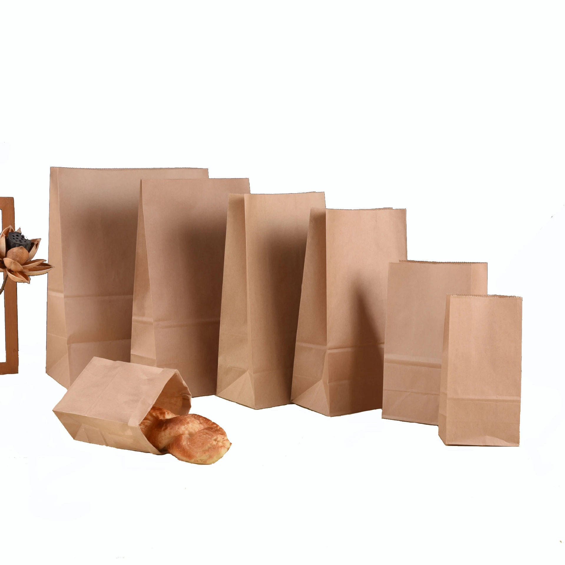 Hot Sale Custom Logo Brown Kraft Paper Bag with Perforations Square Bottom Takeaway for Food and Clothing