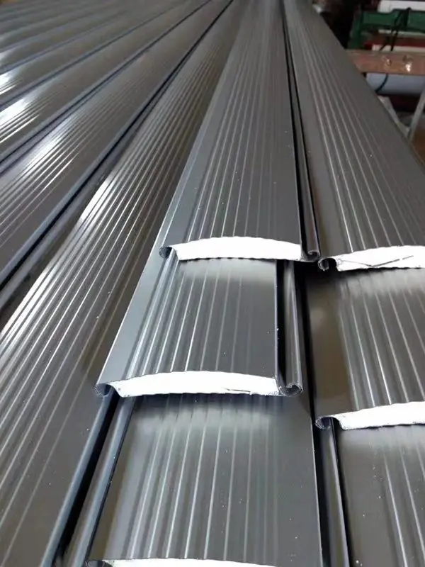 45/55/77 PU foam roller shutter door machine fast speed0-30/min PU foam roller shutter slat roll forming machine