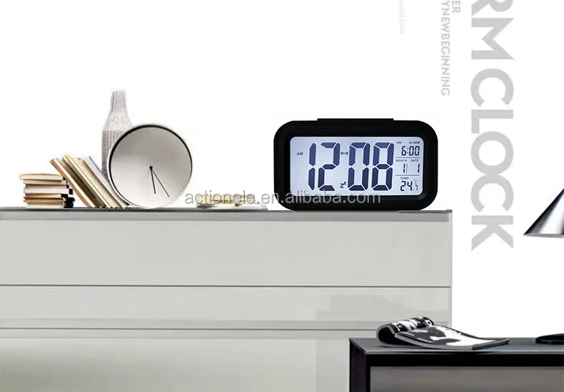 Classic LCD digital clock with calendar light sensor and alarm snooze