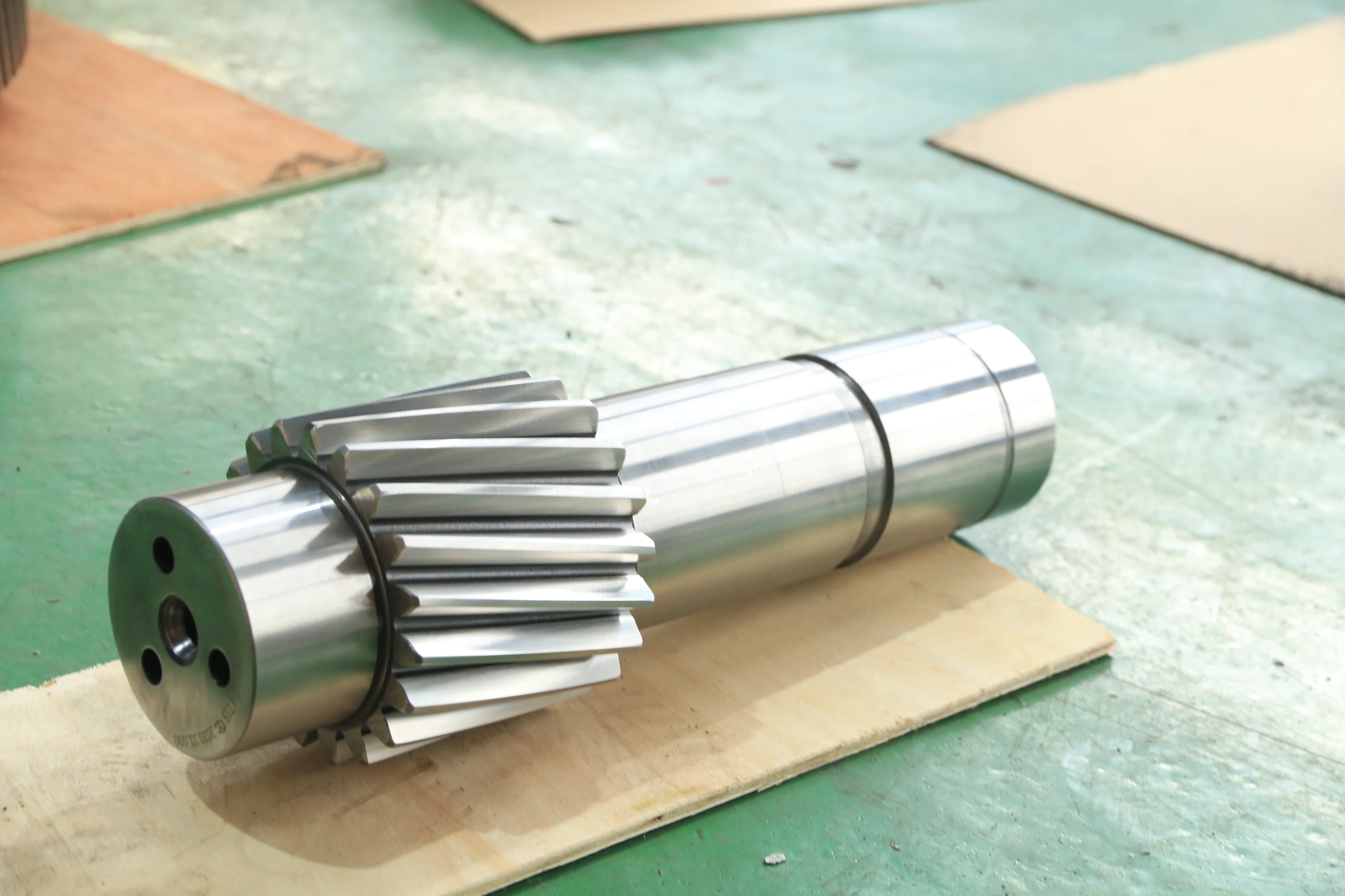 
Grinding helical gear and shaft for agricultural machinery 