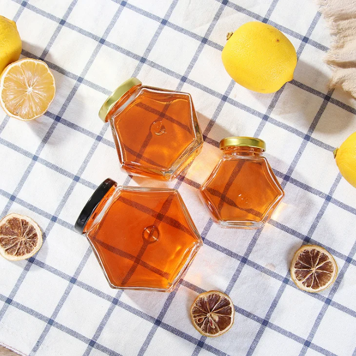 Wholesale 100ml 180ml Empty Unique Small Hexagon Honey Jam Glass Jars In Bulk With Metal Screw Lid