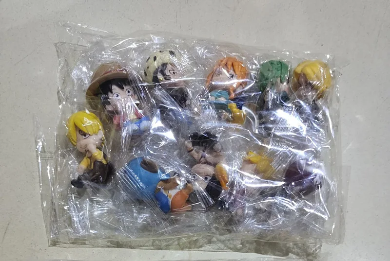 wholesale 10 pcs one pieces Hot Sale Anime One Pieces Luffy Zoro Nami Sanji Robin Action Figure PVC Statue Action Figures