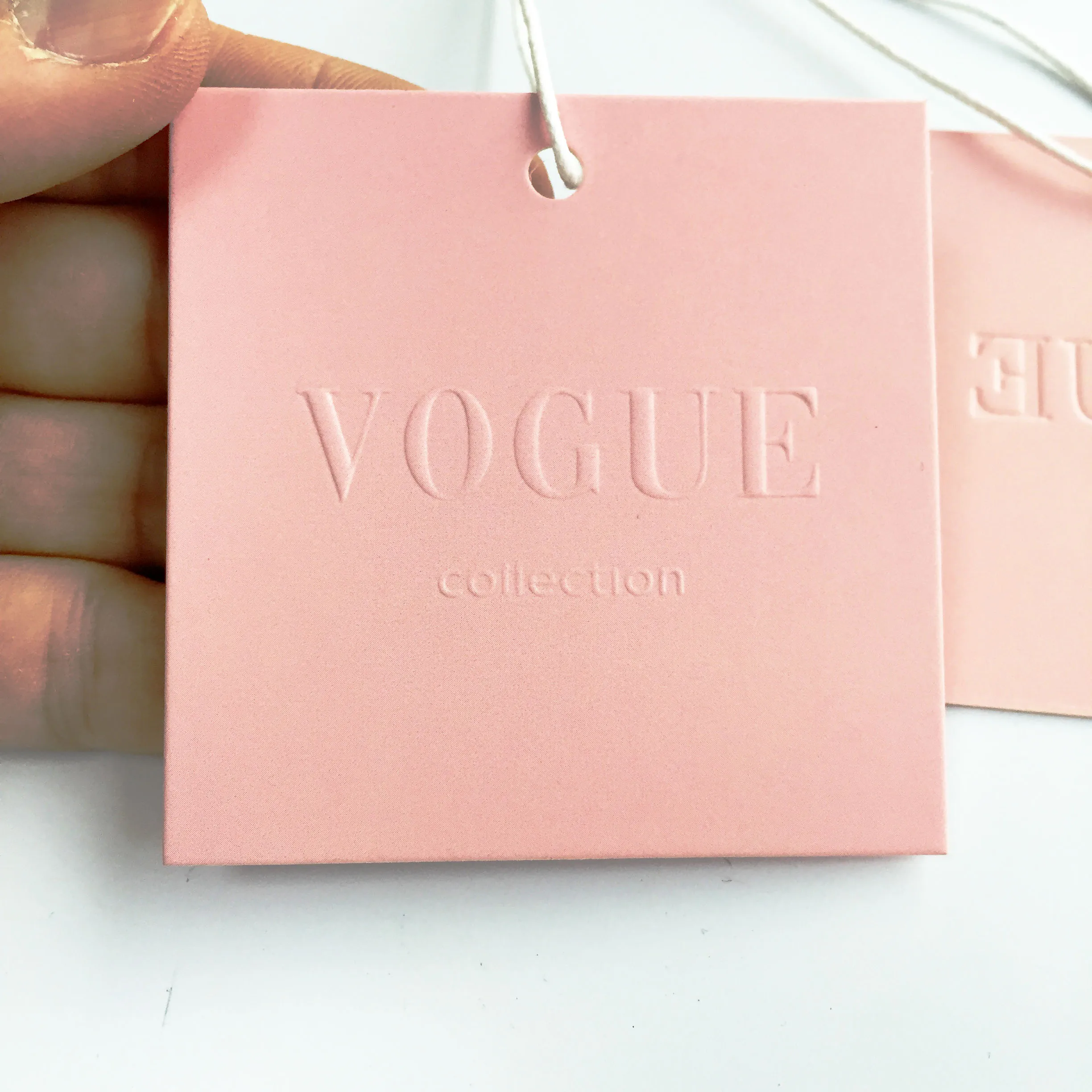 Custom Embossed Brand Logo Eco-friendly Pink Paper Garment Shirt Shoes Bags Swing Hang Tag for Clothing