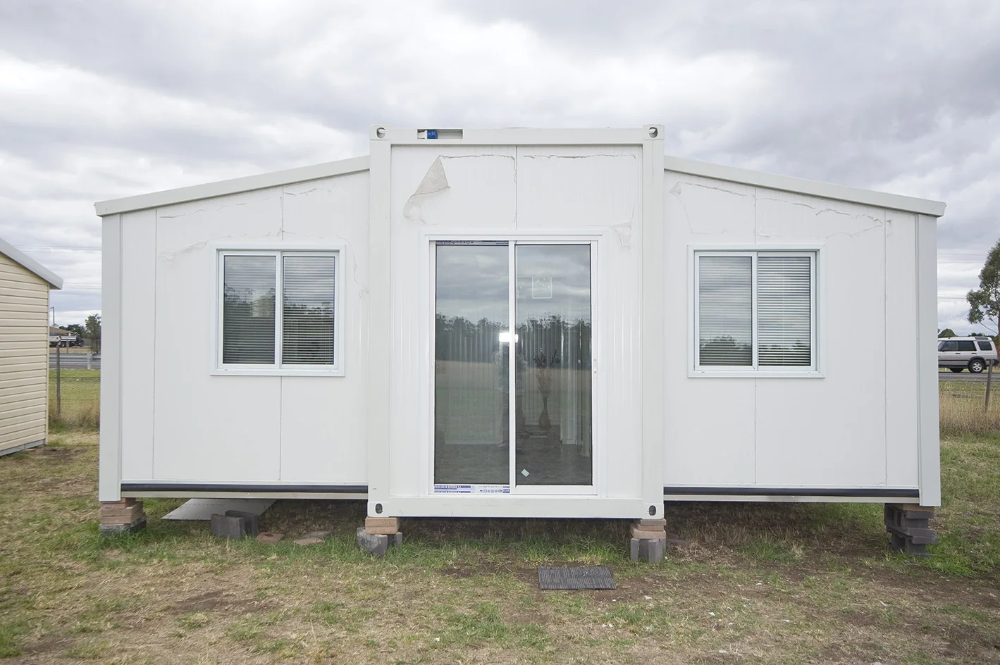Контейнерный Стальной дом 27sqmprefab расширяемый крошечный контейнерный (ванная комната кухня) сборные дома для