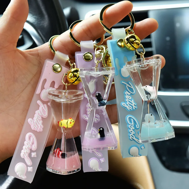 Wholesale quicksand liquid keychain with ocean doll hourglass key chain into oil funnel floating bottle gift pendant