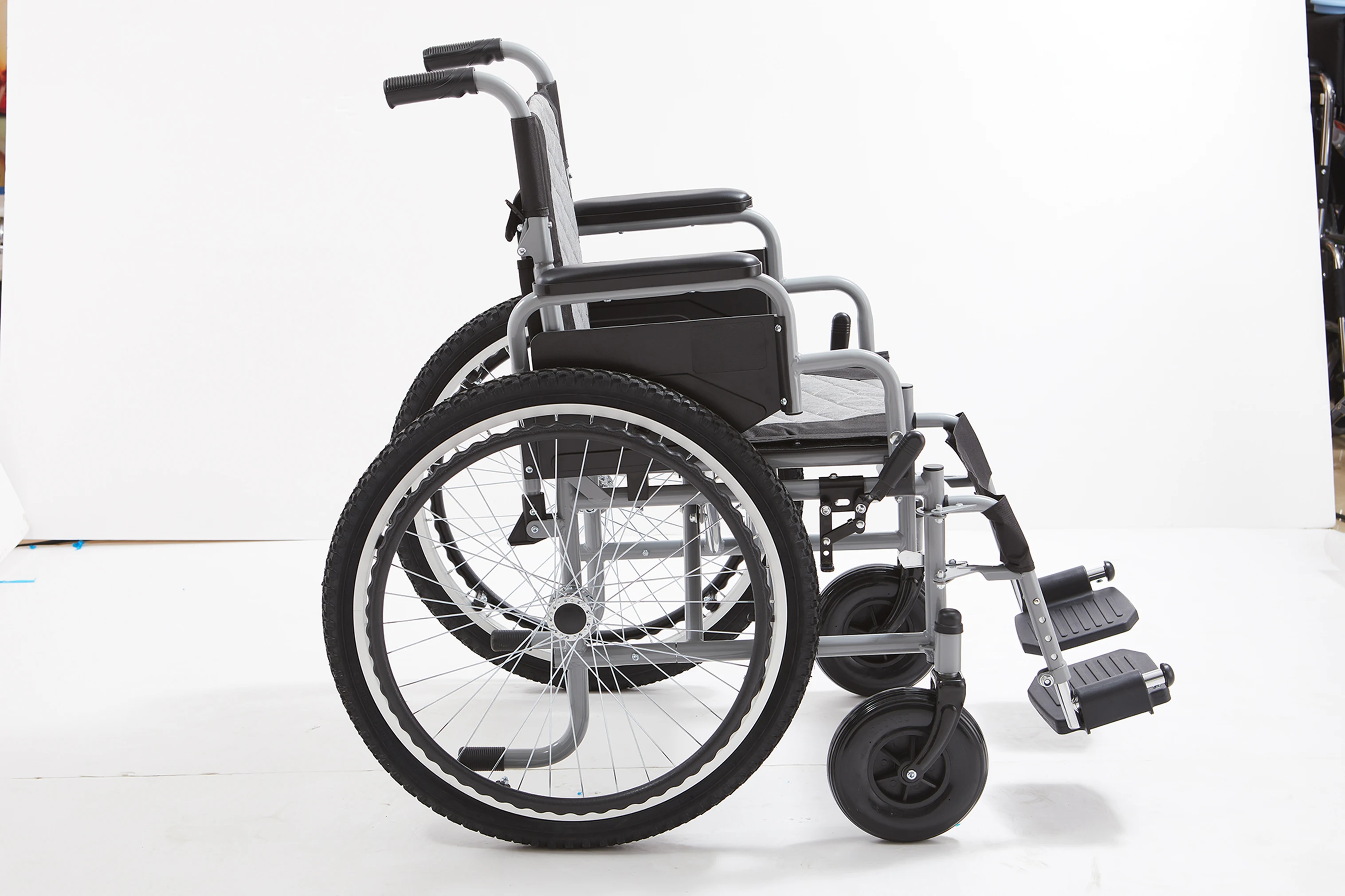 Functional Steel Manual Wheelchair for Elderly with Orthotics Flip Armrests and Detachable Footrest manual wheelchair