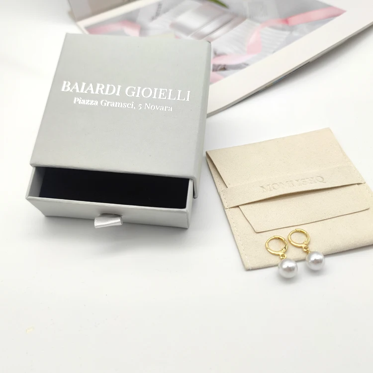 Custom Stamped Logo Stocked Cream Microfiber fabric suede pouch with flap & band beige color jewelry bags packaging