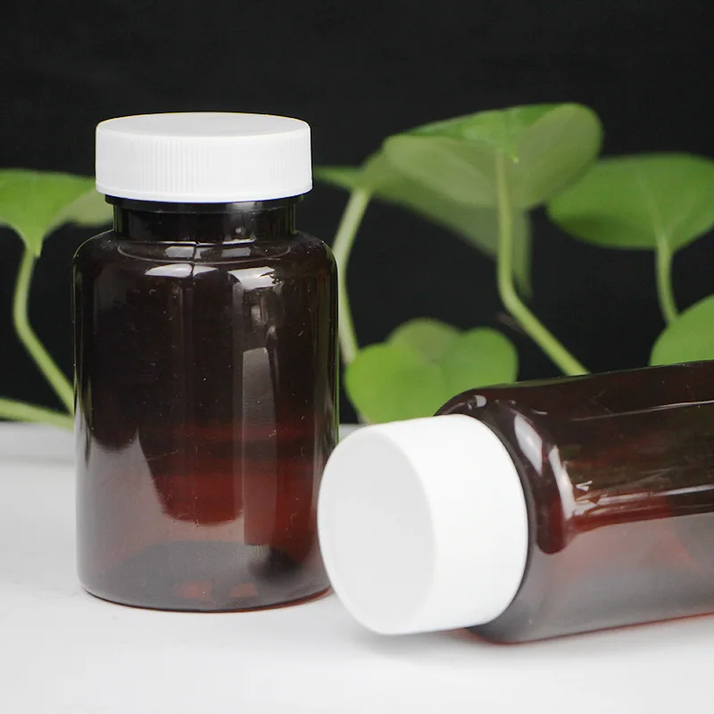 200cc Amber plastic bottle with aluminum foil  and white Lids