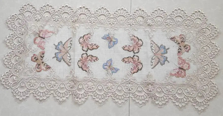 expensive embroidered tablecloth with cutwork