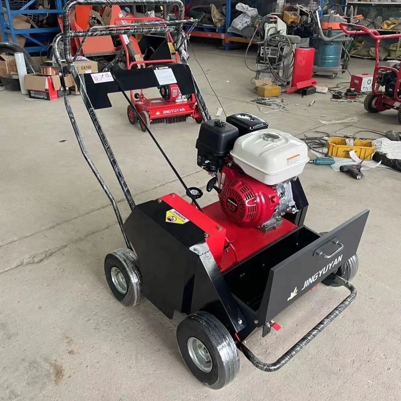 Turf comb machine with manual push to remove dea d grass