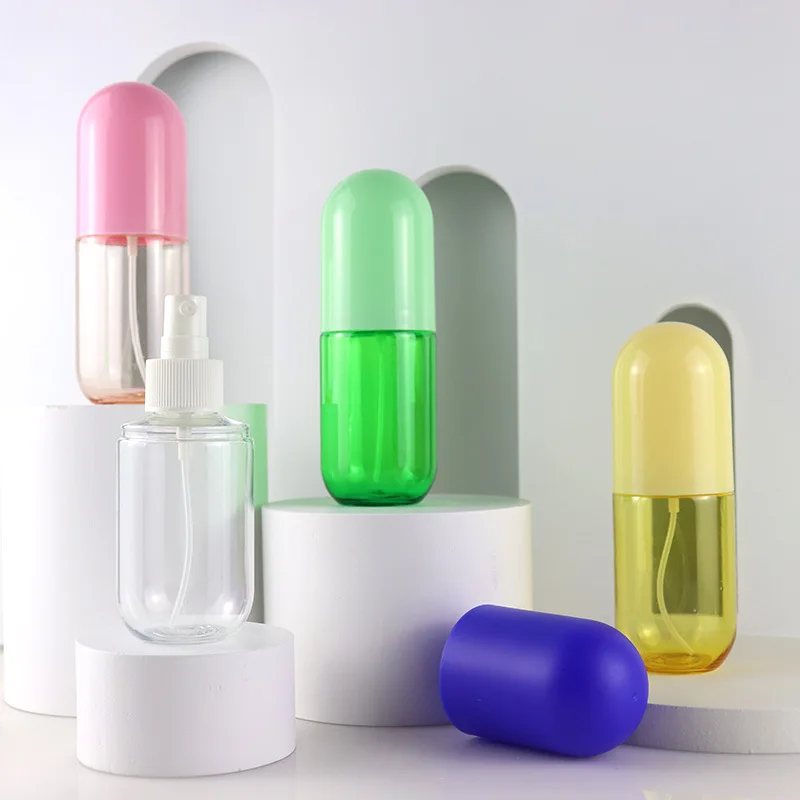 New design Color Pill Capsule Shaped 40ml 60ml 100ml Pink Blue portable pump cute wholesale plastic bottles spray bottle