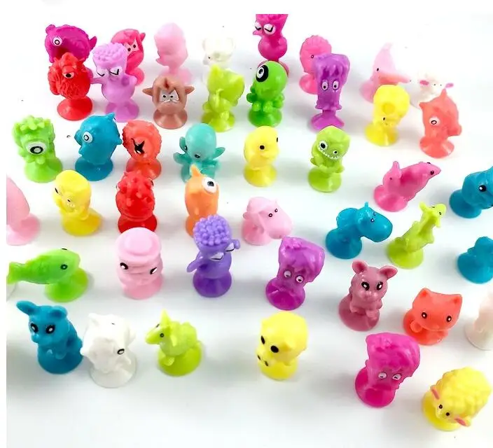 Mini Monster Sucker Capsule Model Little Cartoon Anime Animal Action Figures Suction Cup Puppets Toys For Children