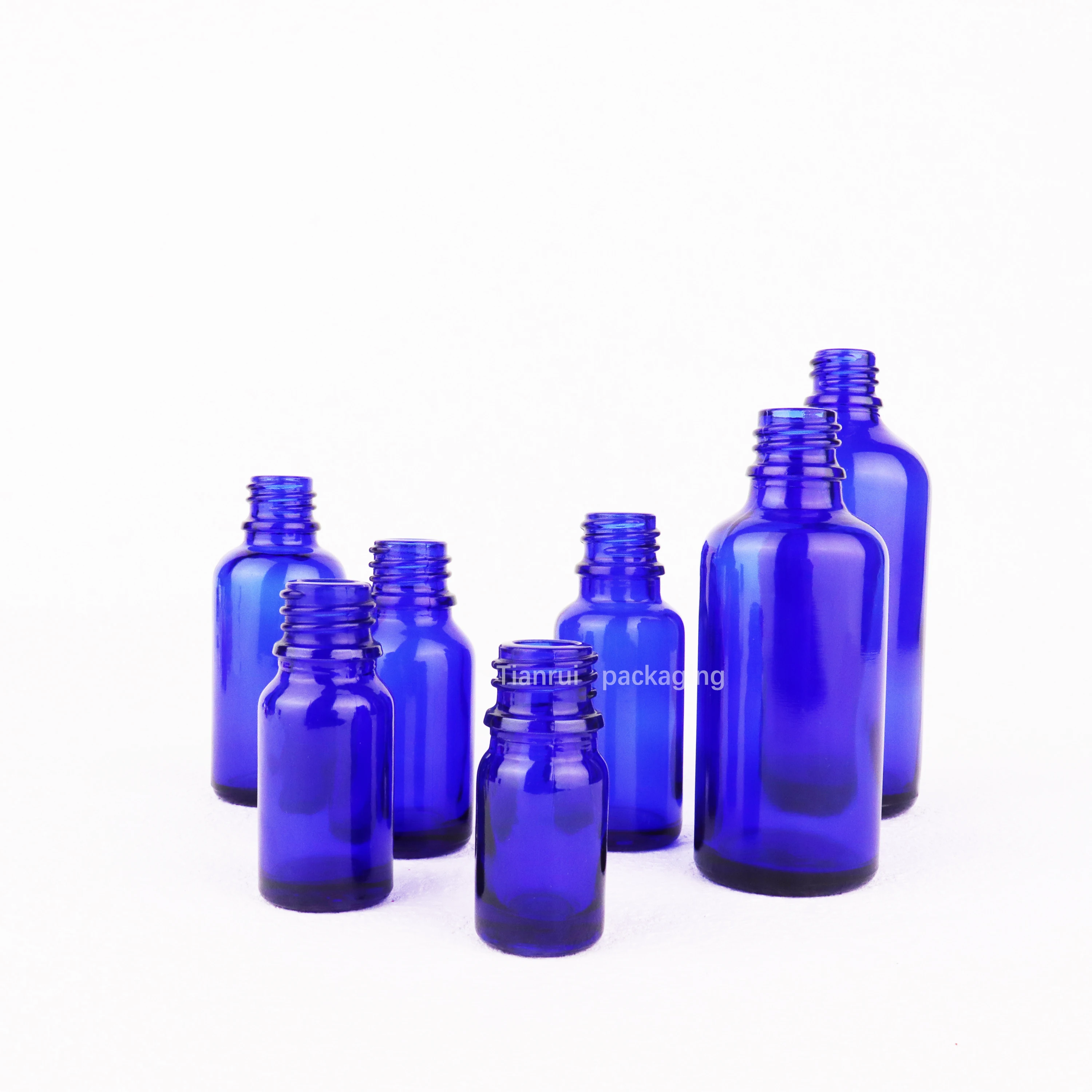 Low MOQ Essential Oil Product Container Colored Glass Dropper Bottles 5 10 15 20 30 50 100ml 2 oz Blue Serum Bottles