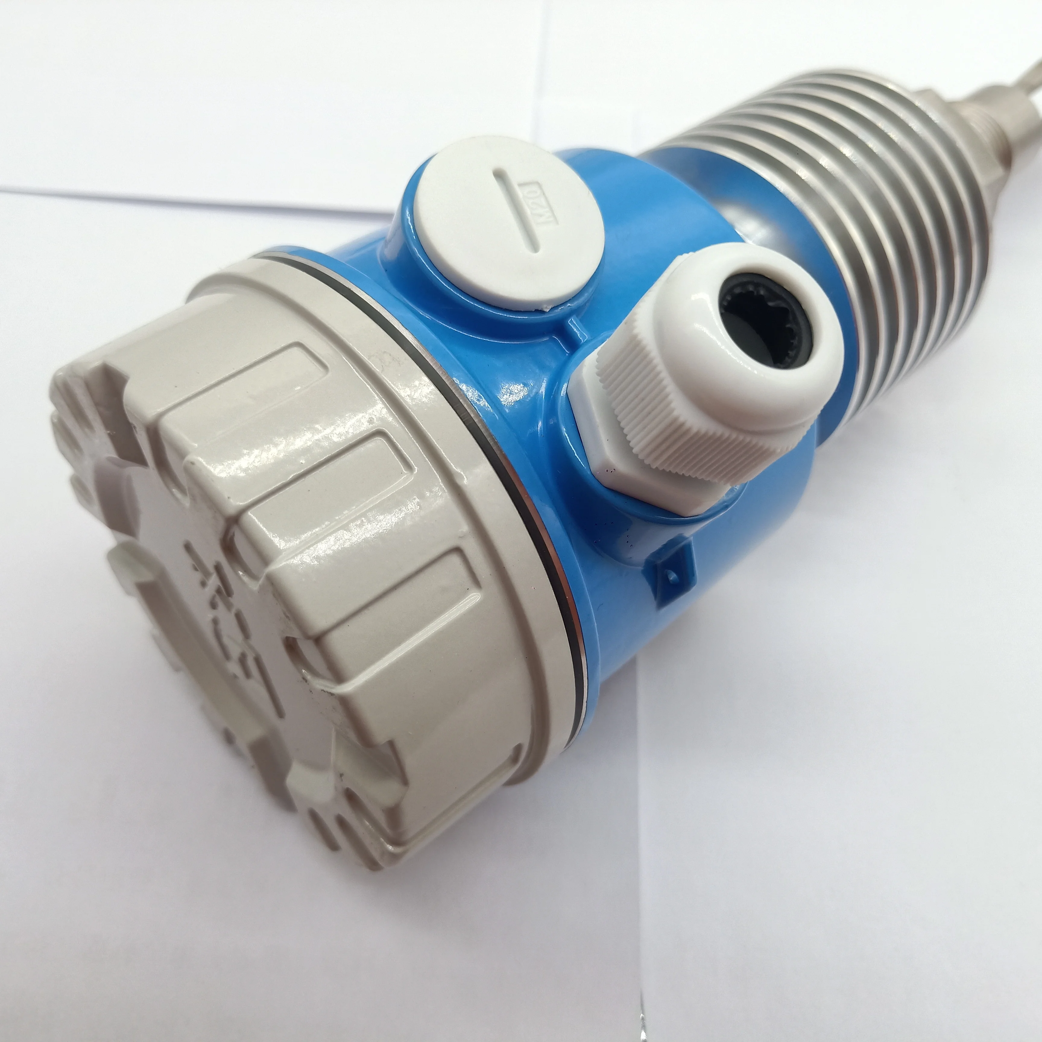 Tuning fork level switch for solid vibrating rod level switch