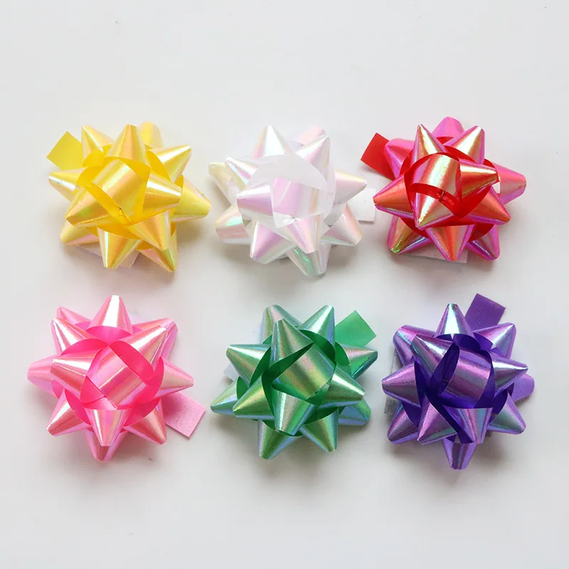 Разноцветные ленты с бантом в виде звезд для подарочной упаковки