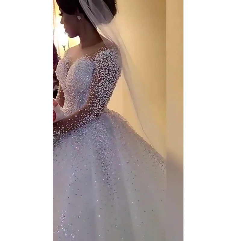 Luxury pearls ball gown wedding dress long sleeve v neck heavy pearl beaded wedding gown bridal dress