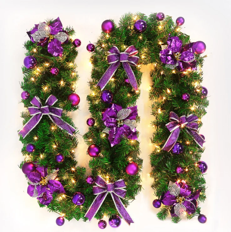 Wholesale Christmas flower bowknot decorated led pre lit artificial christmas garland